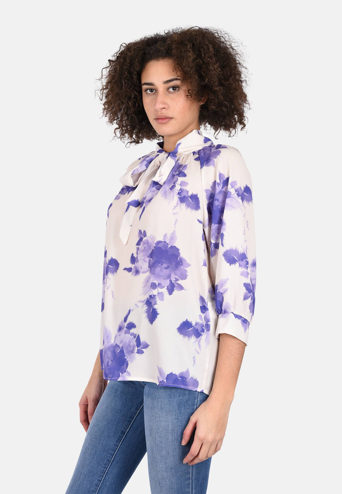 Blusa lilla con fiori