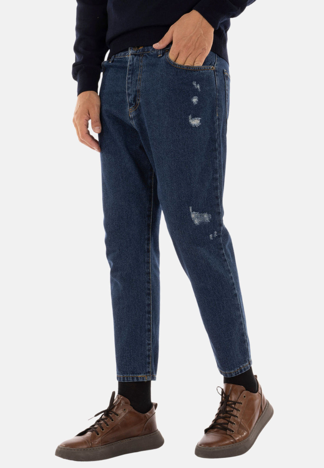 Jeans strappato capri